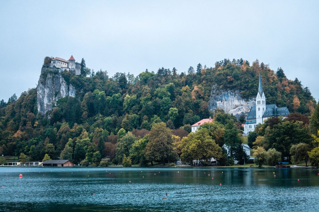Traveling family looking on Bled Lake, Slovenia, Europe